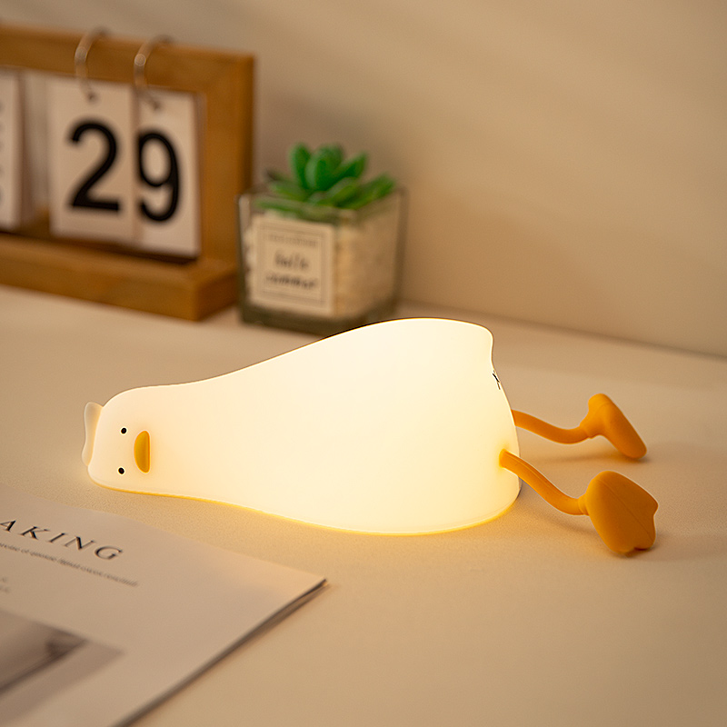Phone Holder - Lampka nocna w kształcie leżącej kaczki,